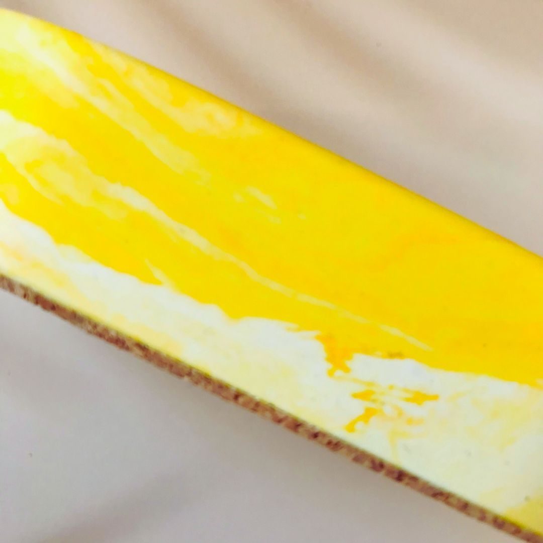 yellow white tea light holder close up