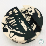 black white splatter effect circular phone holder jesmonite