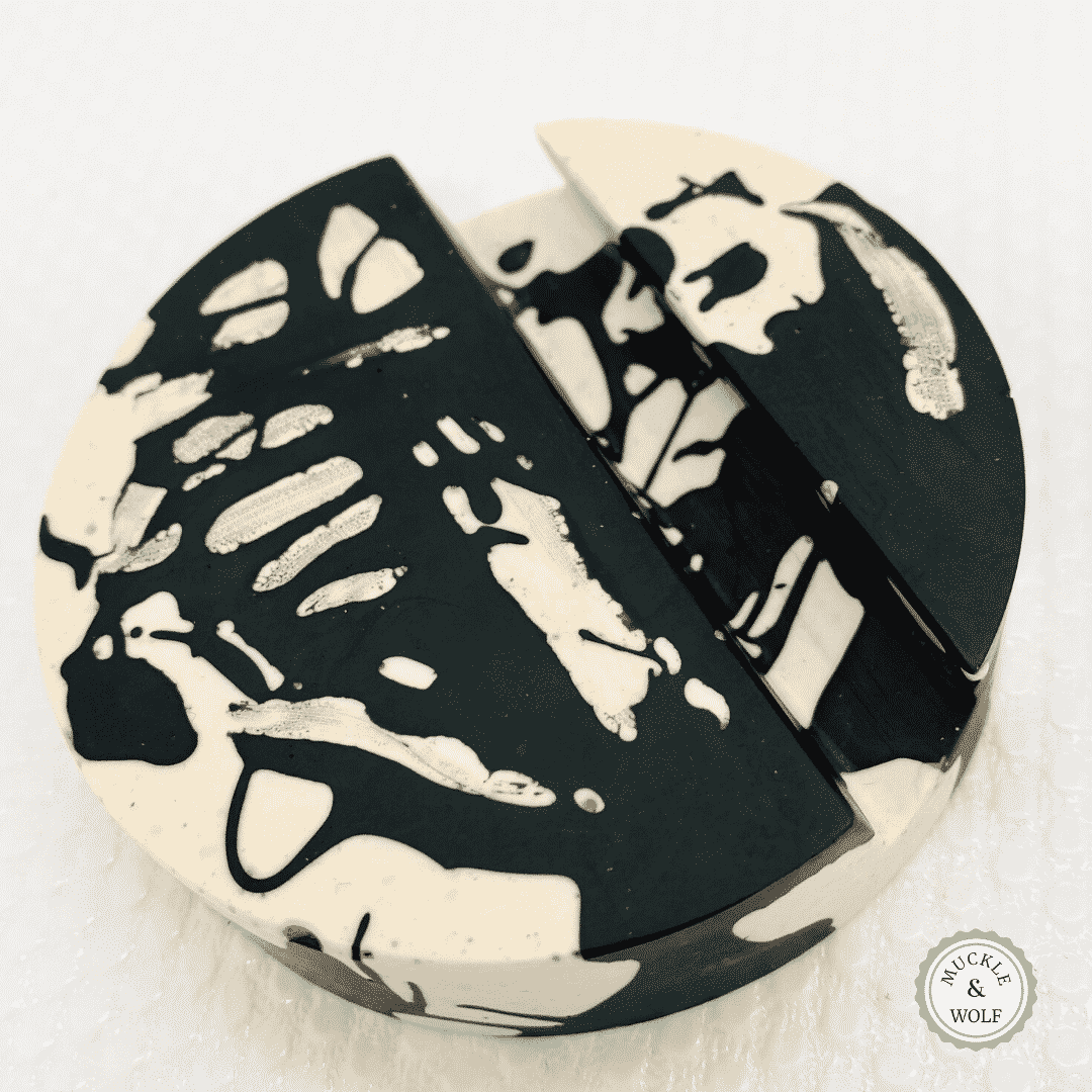 black white splatter effect circular phone holder jesmonite